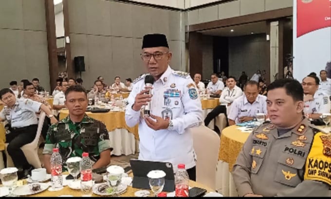 Jangcik Mohza saat memaparkan kesiapan pilkada Merangin