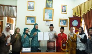 Diskominfo dan PKK Merangin Teken MoU Perkuat Program Pemberdayaan dan Kesejahteraan Keluarga